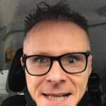 Image of Richard taken at the wheel of his cab looking angry with his ADHD